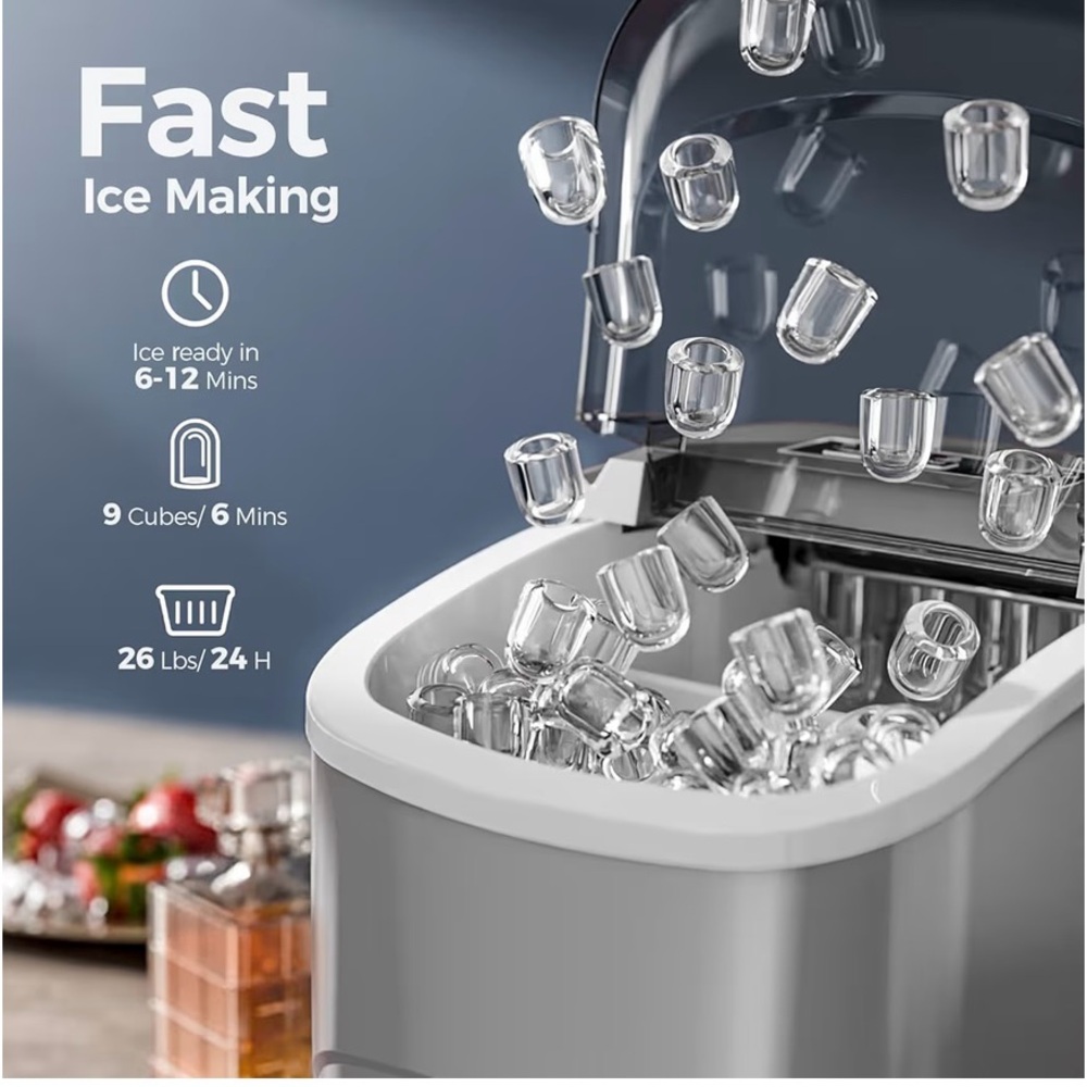 Grey countertop ice maker machine